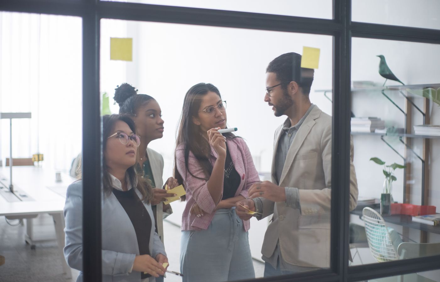 Colleagues collaborating in a bright office