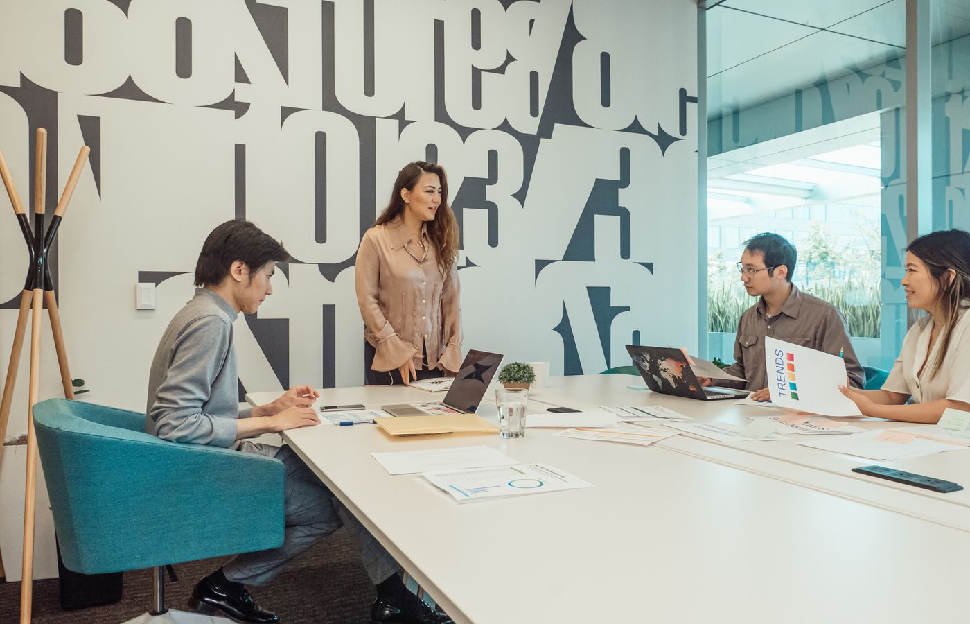Team brainstorming a project around a table