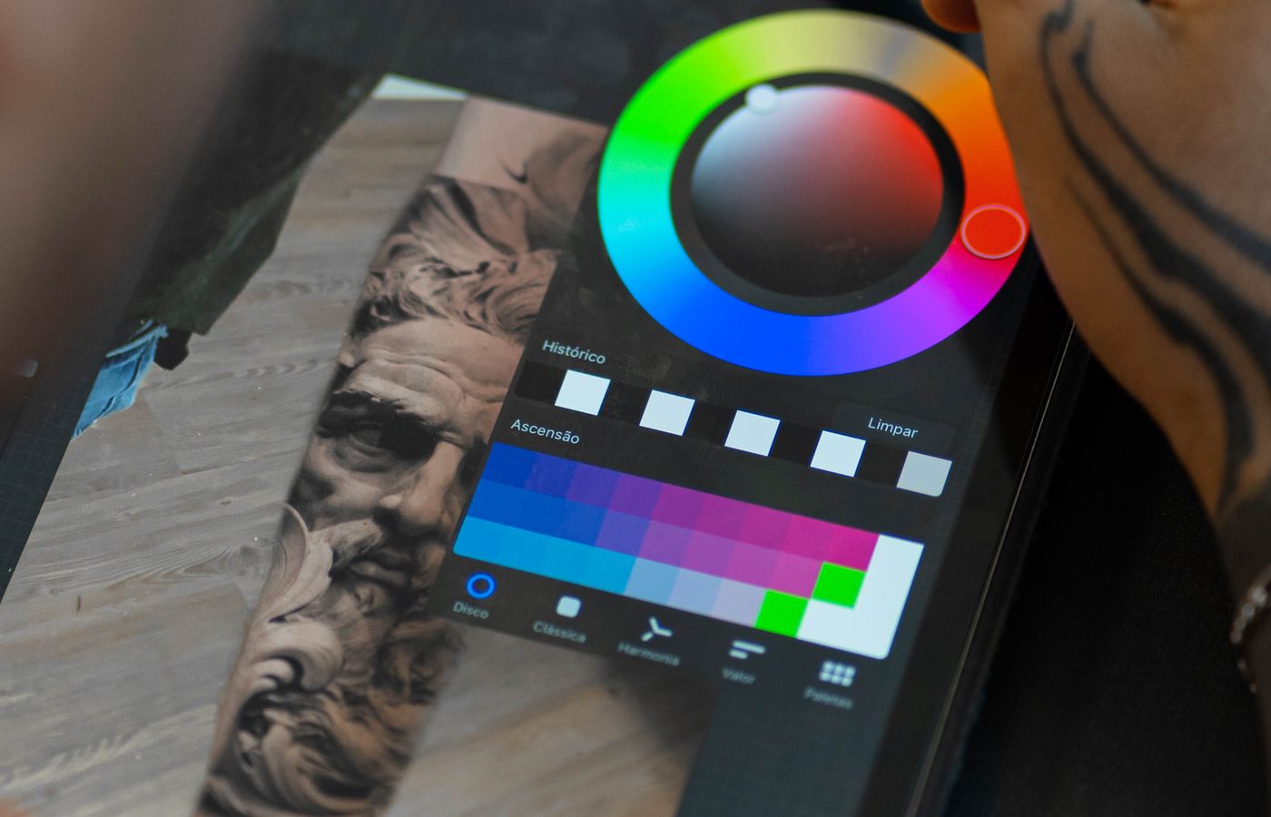 Designer working with digital colors and a graphics tablet